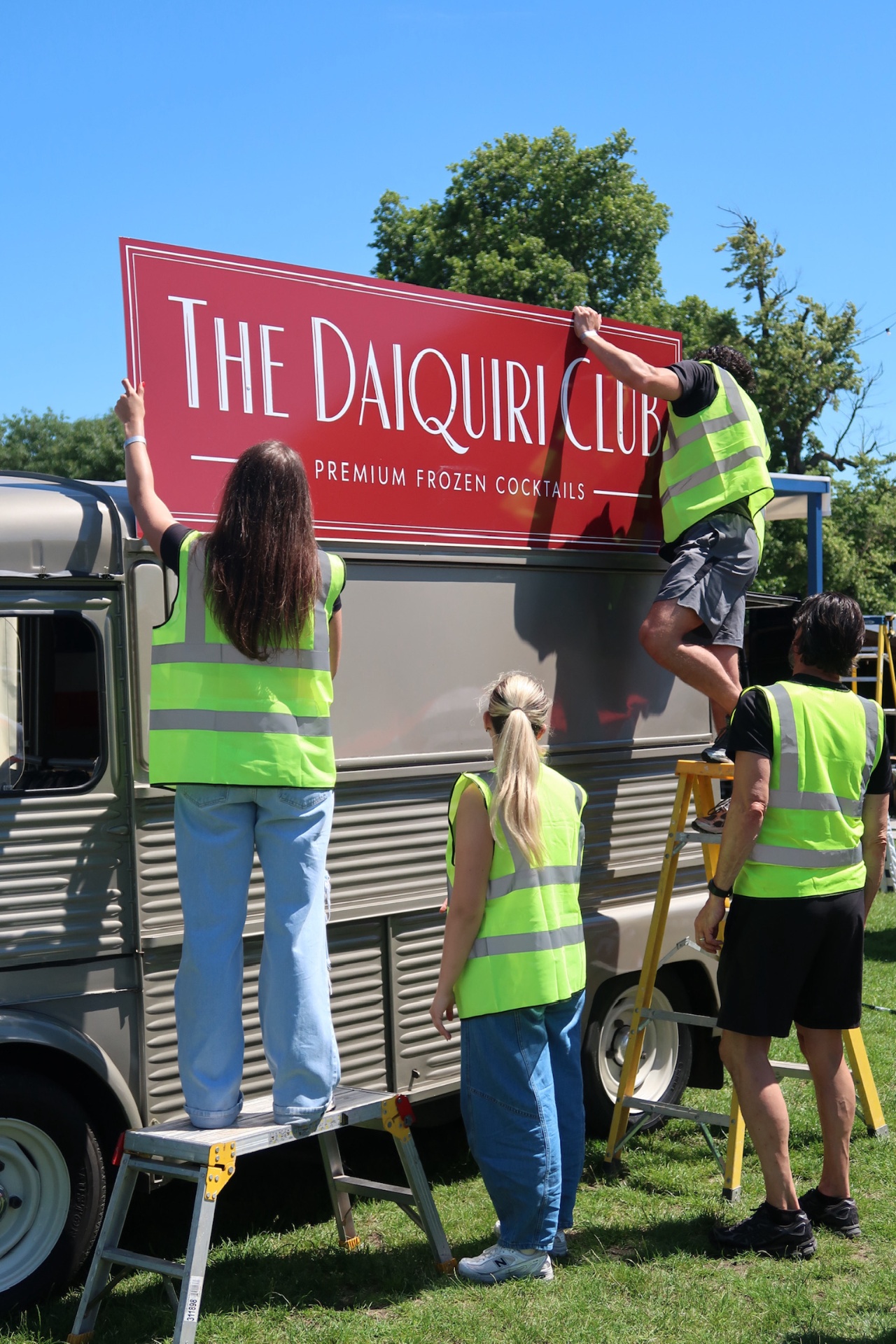 Team setup at the van in hi-vis vests